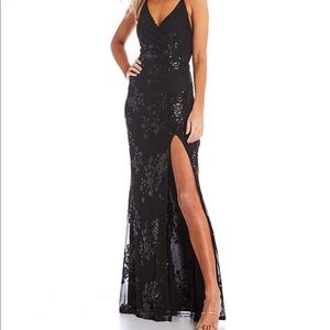Black long prom dress. Size 0 never worn still has tags